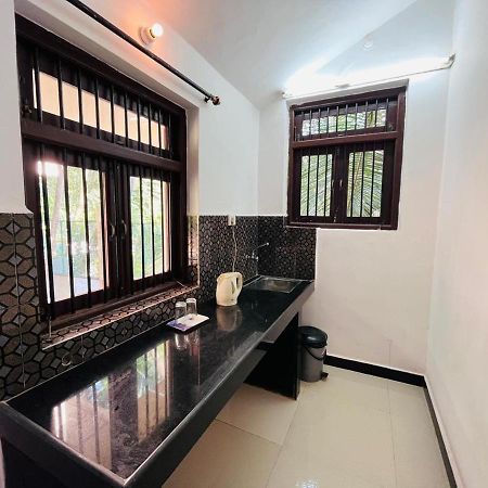 Naga Cottages Morjim Esterno foto