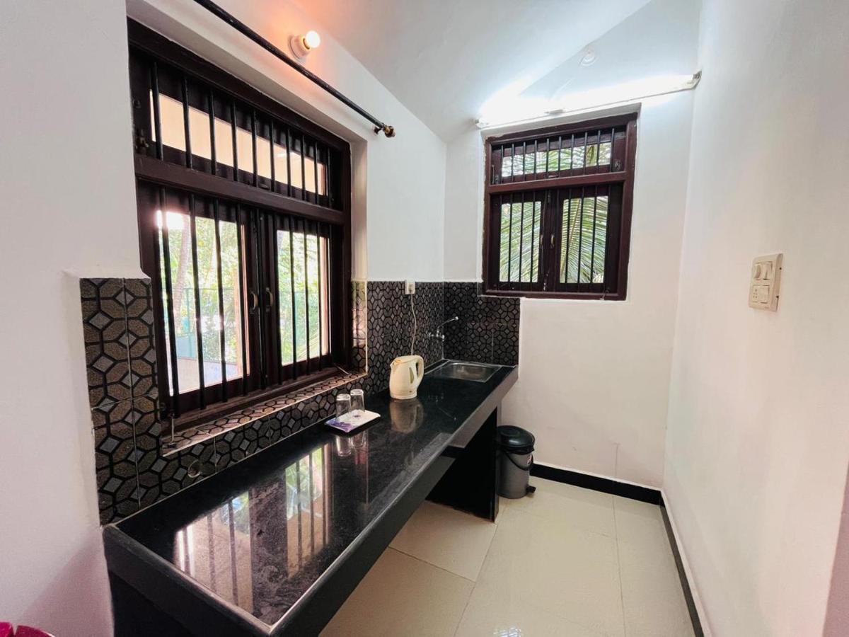 Naga Cottages Morjim Esterno foto