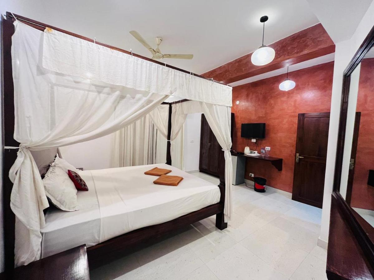 Naga Cottages Morjim Esterno foto