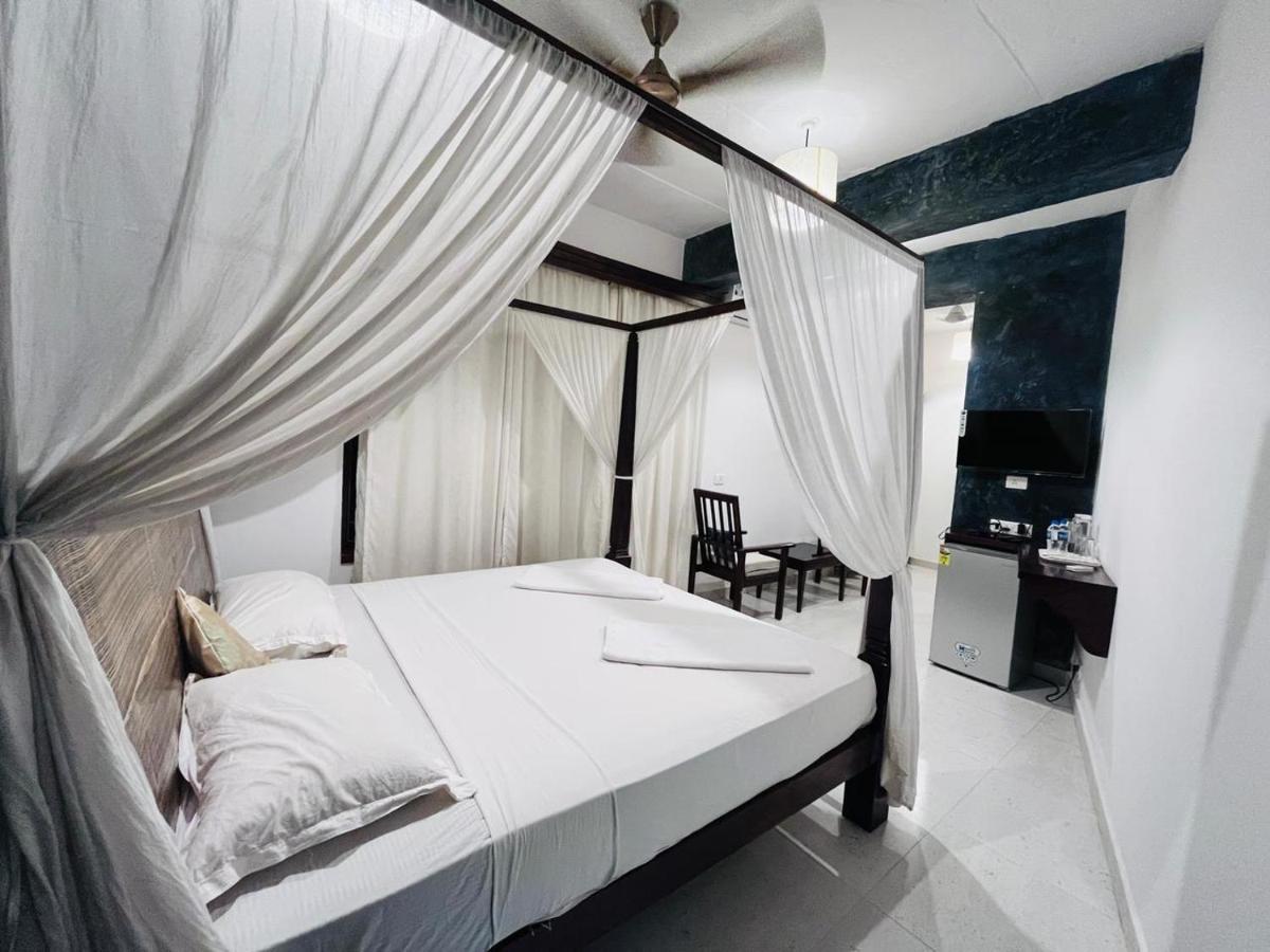 Naga Cottages Morjim Esterno foto