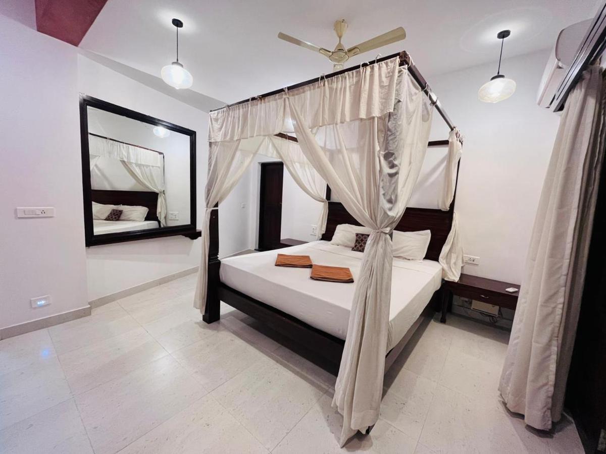 Naga Cottages Morjim Esterno foto