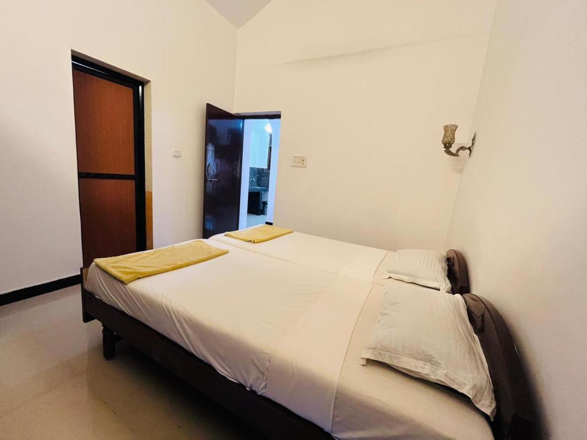 Naga Cottages Morjim Esterno foto