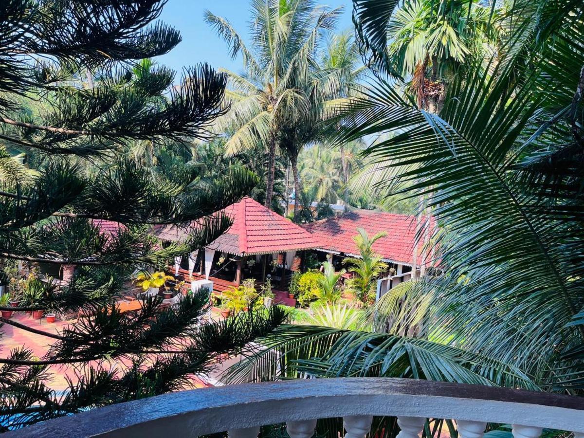 Naga Cottages Morjim Esterno foto