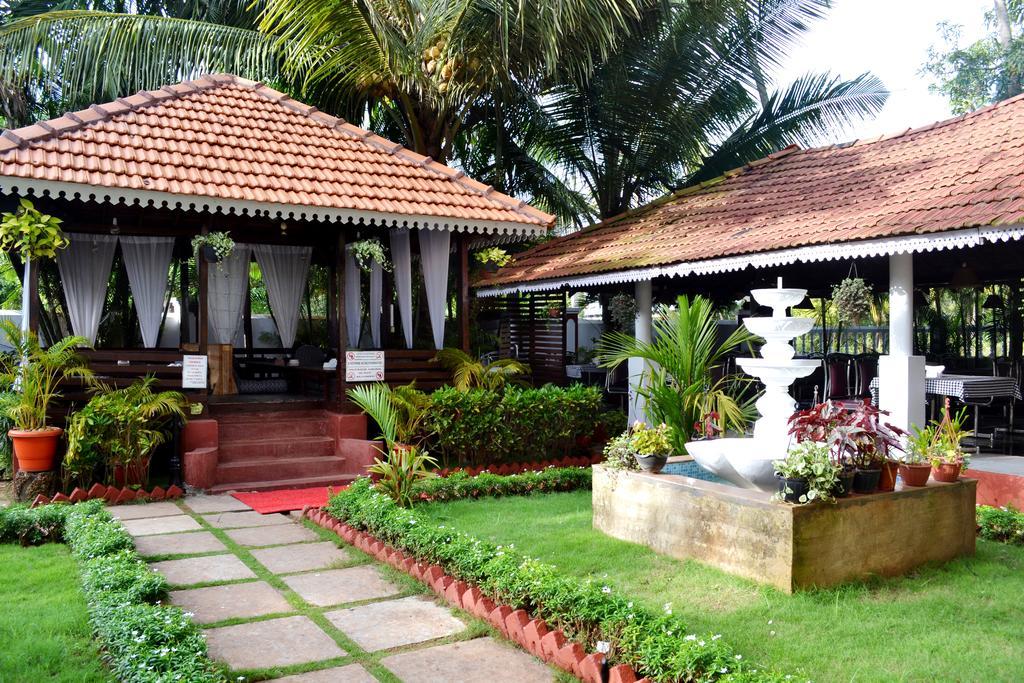 Naga Cottages Morjim Esterno foto